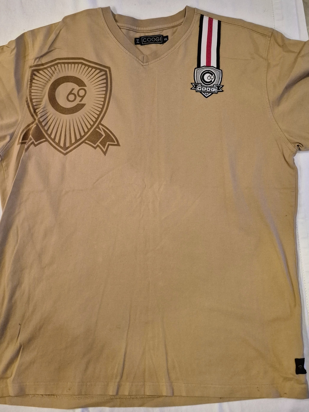 COOGI Tan V-Neck Tee with Crest and Stripe Detail